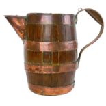An unusual 19th coopered oak jug.