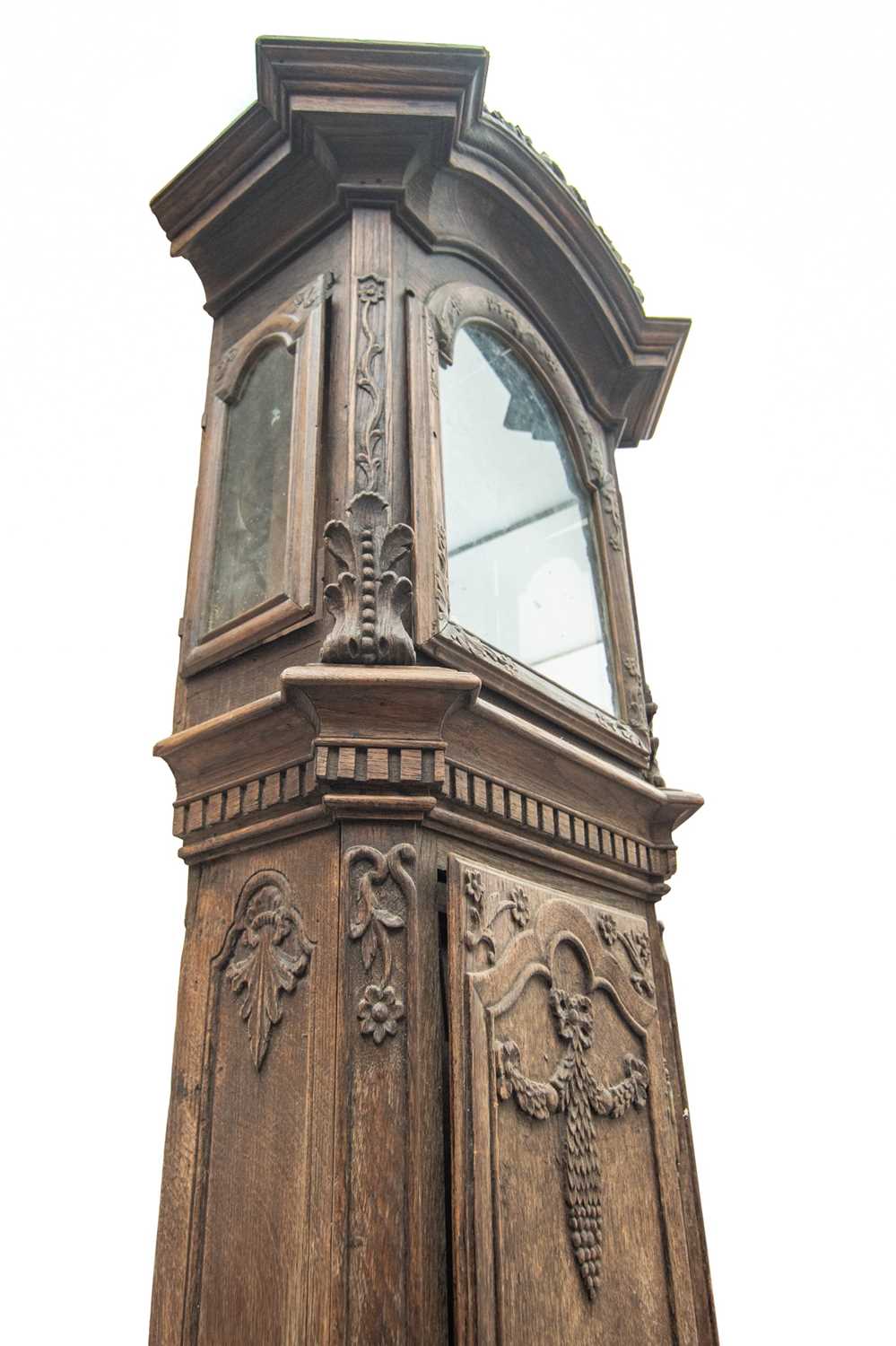 A late 19th century French provincial oak carved longcase clock. - Image 4 of 7