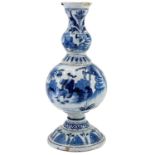 A Dutch Delft blue and white vase.