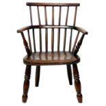 A beech, ash and elm child's Windsor chair.