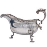 A Victorian silver gravy boat by Charles Stuart Harris.