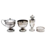 A George V silver three piece cruet set by Henry Clifford Davis.