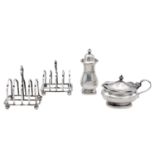 A pair of George V silver toast racks and a two piece cruet.