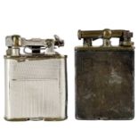 A Sterling silver engine turned pocket lighter.