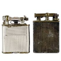 A Sterling silver engine turned pocket lighter.