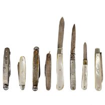 A collection of eight silver blade folding pocket knives.