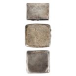 Three George V silver engraved cigarette cases.