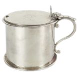 A Victorian silver hinge lidded mustard pot by Robert Hennell.