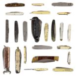 A collection of folding and combination pocket knives.