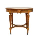 An Edwardian mahogany oval occasional table.