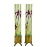 A pair of French Art Nouveau brass and glass vases.
