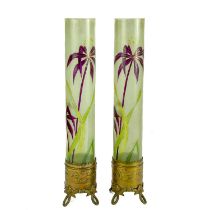 A pair of French Art Nouveau brass and glass vases.