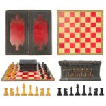 A Staunton box wood and ebony chess set and board.