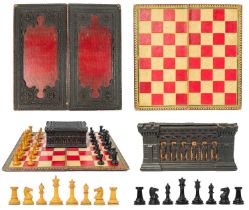 A Staunton box wood and ebony chess set and board.