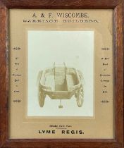 A framed carriage builders advert.