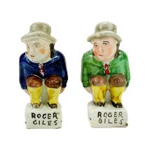 Two Staffordshire figures of Roger Giles.