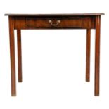 A George III mahogany side table with a single drawer.