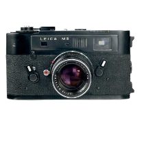 A Leica M5 Rangefinder camera with a SUMMICRON lens.