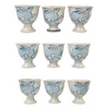 Nine Zane Hazeldine ceramic stem cups.