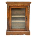 A Victorian walnut inlay and brass mounted pier cabinet.