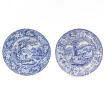 A blue and white shallow bowl printed Fishermen and Nets pattern.