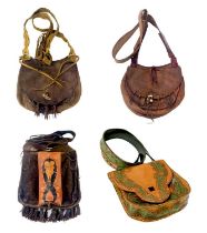 Four handmade leather bags.