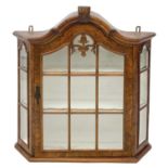 A late 19th century Dutch burr walnut wall hanging display cabinet.