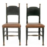 A pair of William Birch Arts and Crafts ebonised oak chairs.