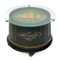 A repurposed painted barrel top maritime coffee table.