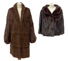 A mink fur coat retailed by Rackhams.