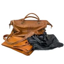 A brown leather holdall.