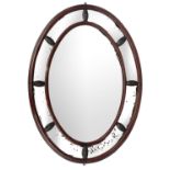 A Victorian mahogany framed oval mirror.