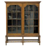 An oak display cabinet or bookcase.