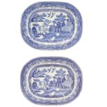 Two 19th century blue and white Staffordshire willow pattern meat platters.