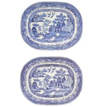 Two 19th century blue and white Staffordshire willow pattern meat platters.