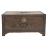 A Chinese carved camphor wood chest.