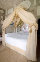 A canopied bed with sumptuous hangings from Tyttenhanger House