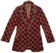 A Gentleman's long smoking-style jacket of embroidered burgandy velvet by Thea Porter