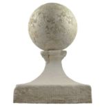 A stone ball and stand