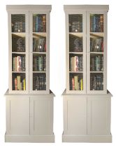 A pair of grey bookcases