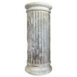 A fluted section of column, possibly antique
