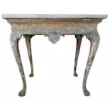 A George II gilt side table, in the manner of James Moore.