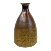 A Peter Lane stoneware bottle neck vase, with potters label and incised initials to base, height