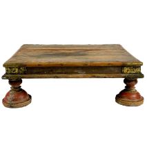 An Indian brass bound wooden low table, early 20th century.