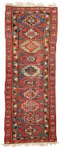 A Kazak long rug, circa 1900-1920.