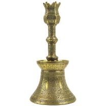 A Persian engraved brass candlestick, Qajar, 19th century.