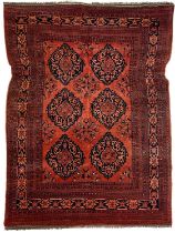 An Afghan rug, mid 20th century.