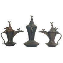 Three Saudi Arabian copper dallah pots.