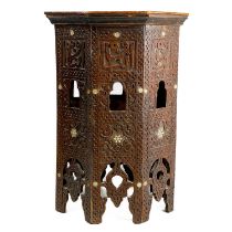 A Syrian carved hardwood octagonal occasional table, 19th century.