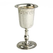 An Indian silver small stemmed cup.